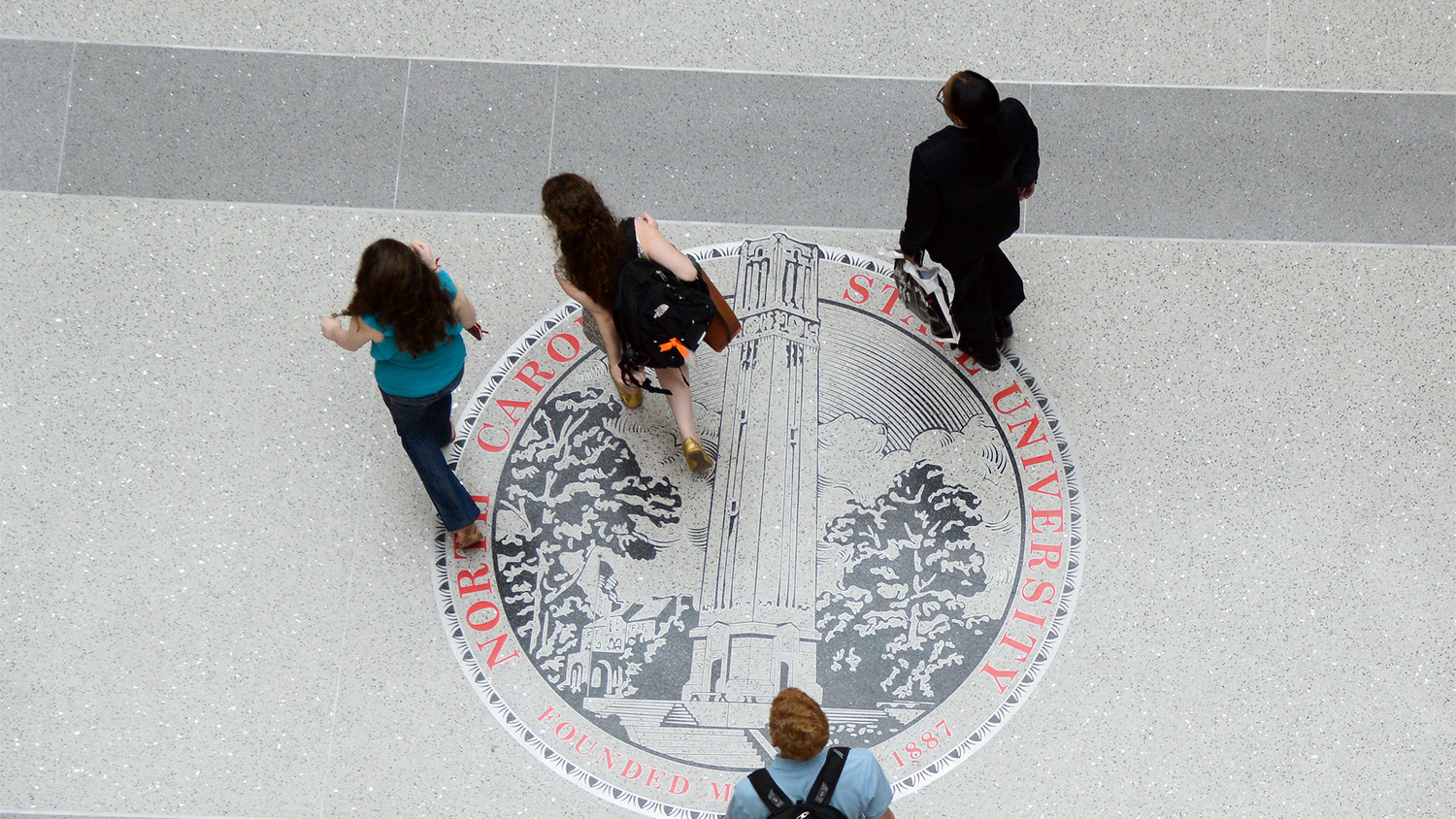 nc_state_seal_with_people