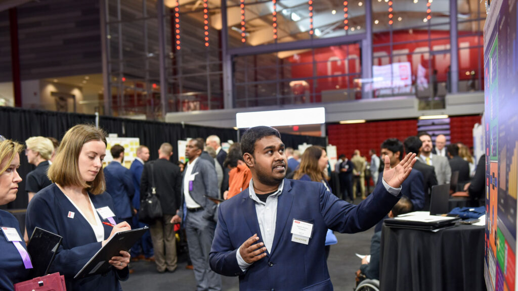 Male student presenting work