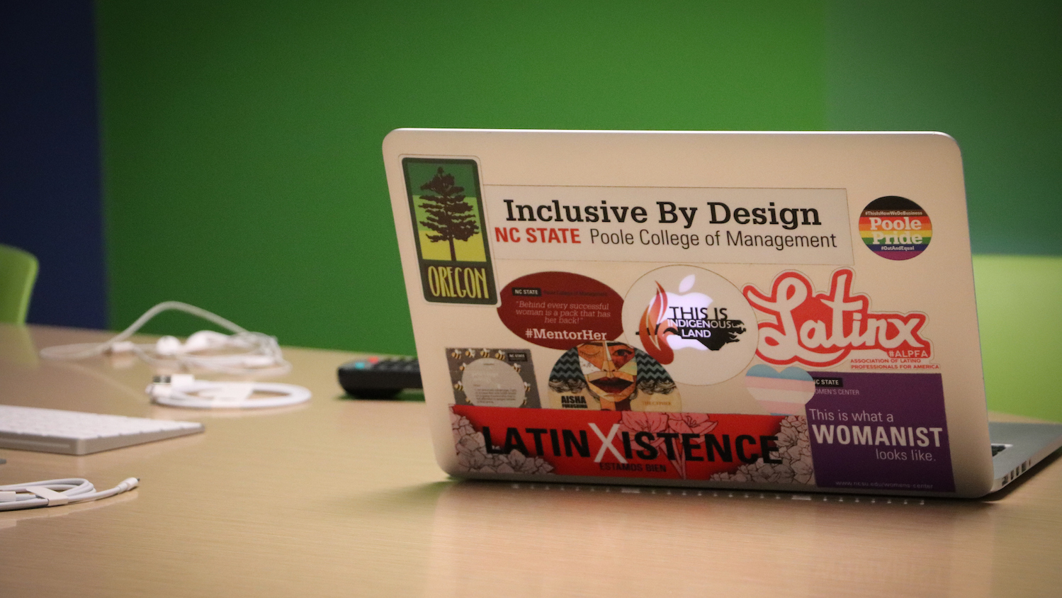 Laptop with Inclusive by Design Stickers