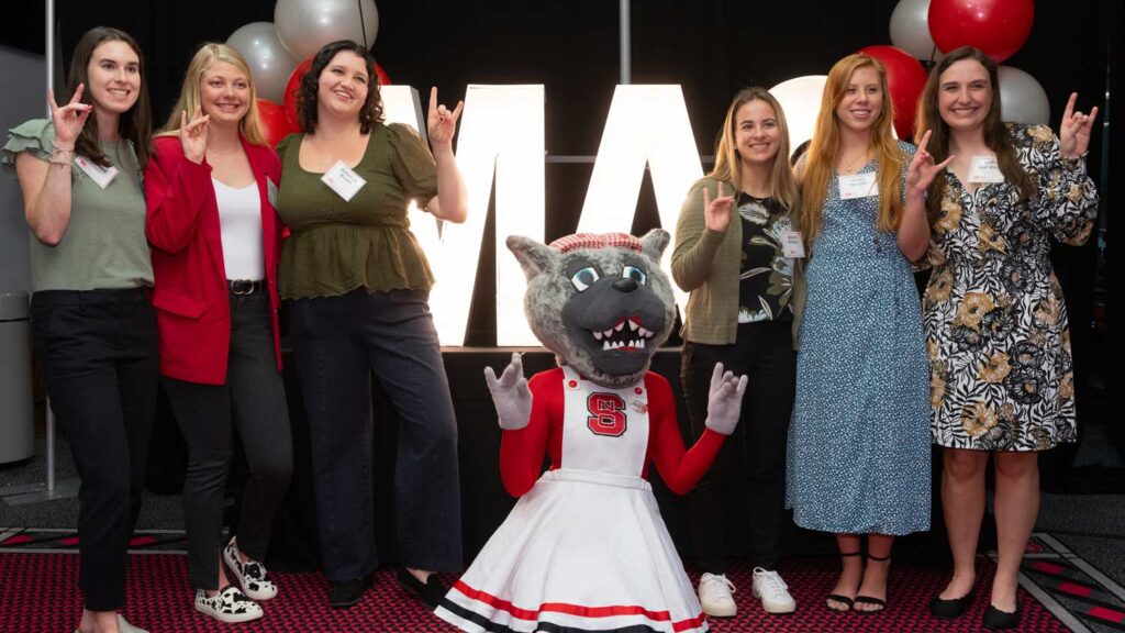 Six females with mascot