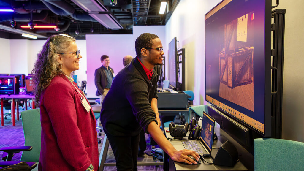 one female and one male in a computer lab