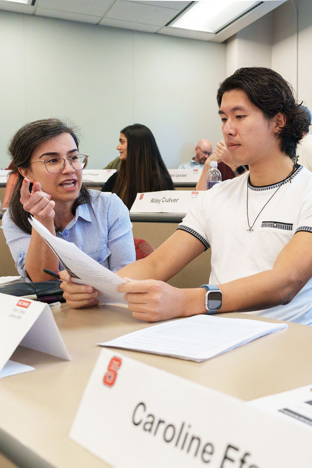 Students collaborating in MBA 560 class