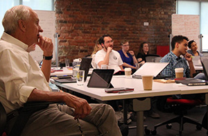 Chip Andrews listens in on team presentations on the first day of the Andrews Launch Accelerator Program at the NC State Entrepreneurship Clinic. 