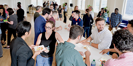 Cup't co-founder Sarah Alenezi networks with other team members and the entrepreneurship community at the Andrews Launch presentations event.