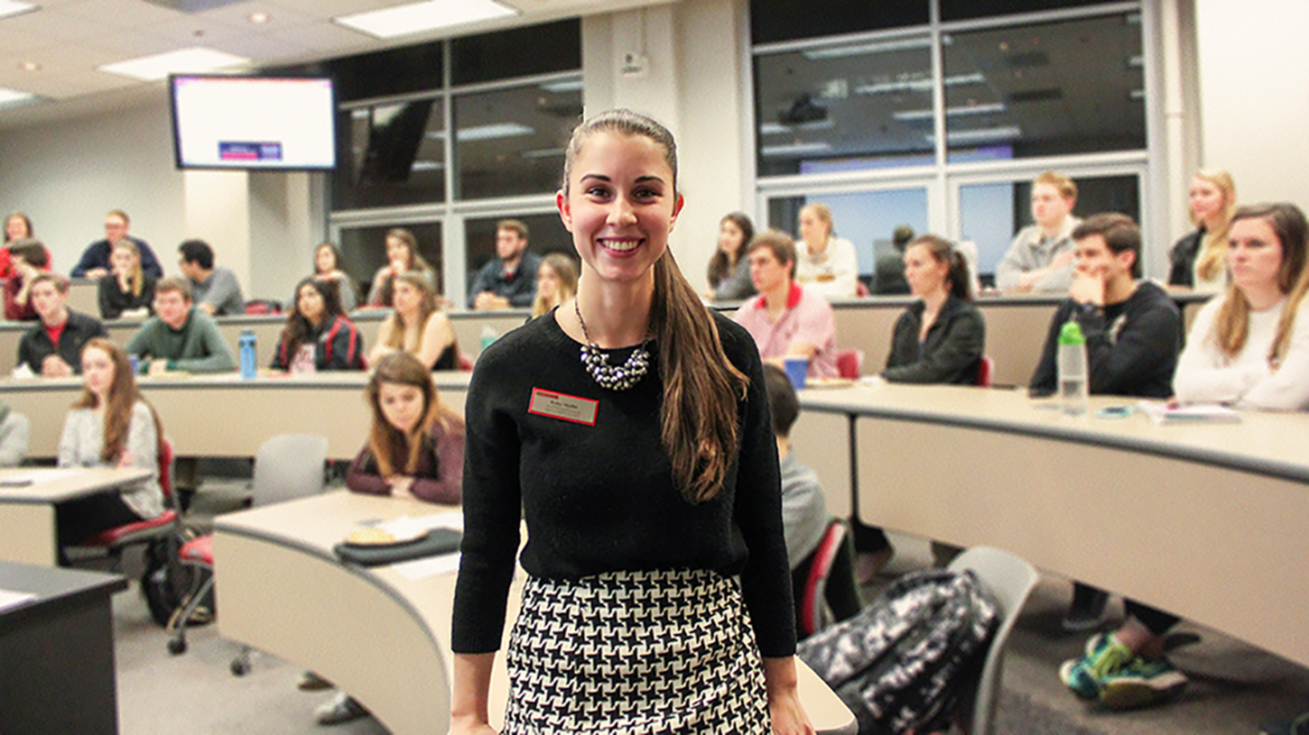 Photo of Kaley Moffitt at an AMA student chapter meeting in Nelson Hall