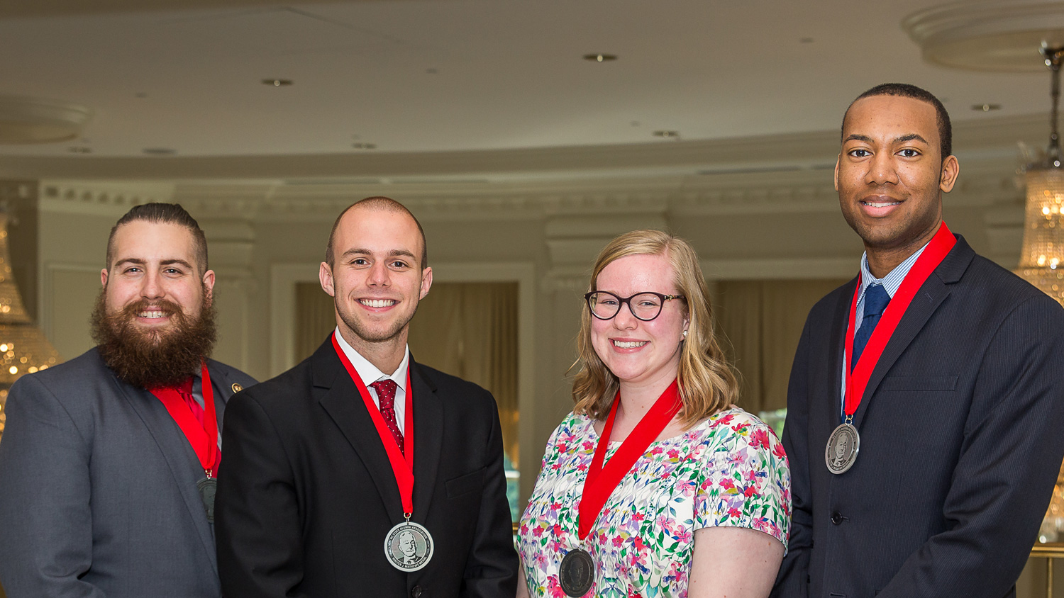 Photo of NC State Student Alumni Association Student Awards recipients from left to right, Justin Rigdon, Hunter Davis, Mary Chamblee, and Tyrek Shepard.