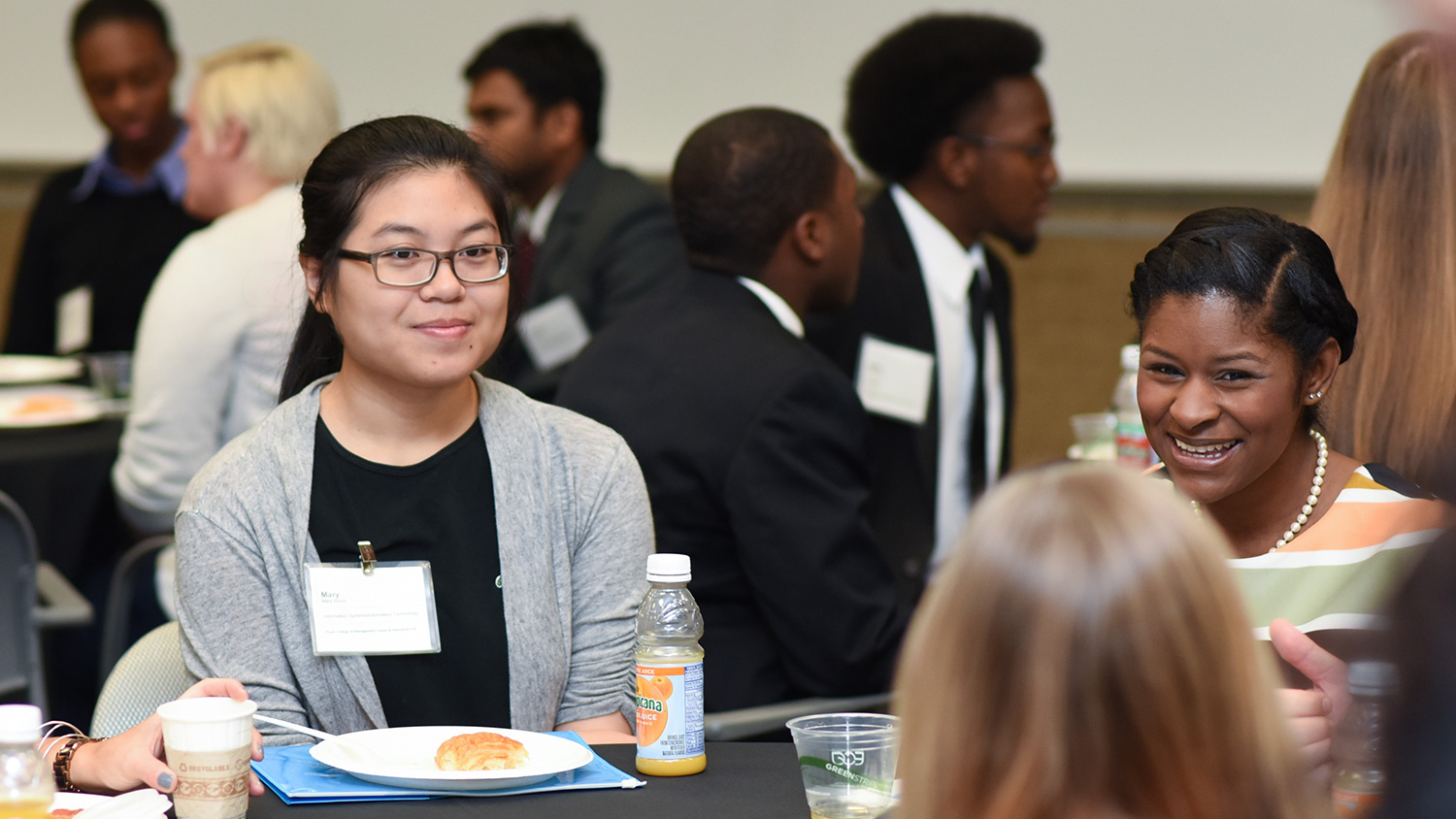 Students and recruiters discuss diversity and inclusion in the workplace at this breakfast meeting.