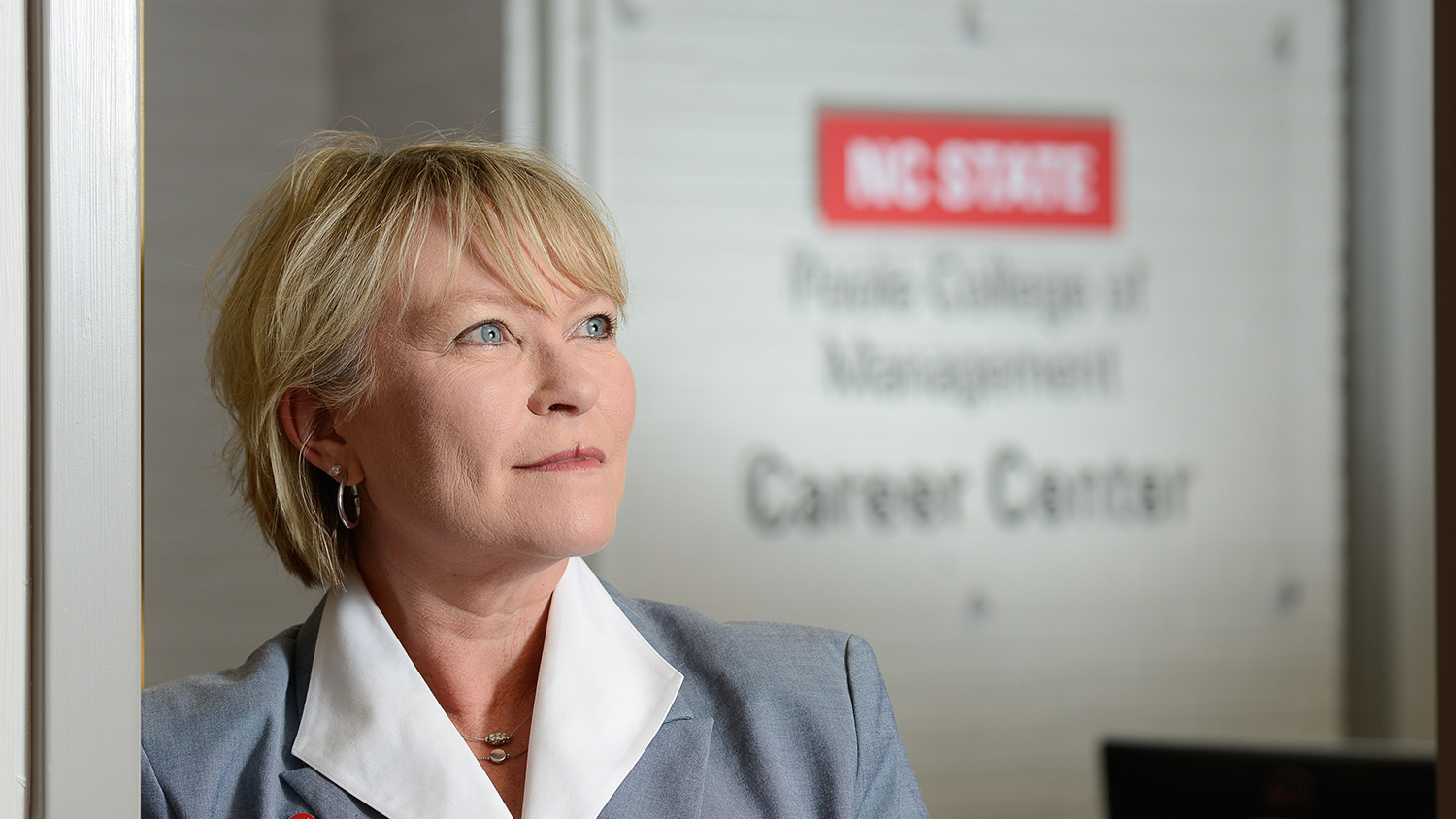 Annette L. Ranft, Poole College's fourth dean, at doorway to the college's Career Center.