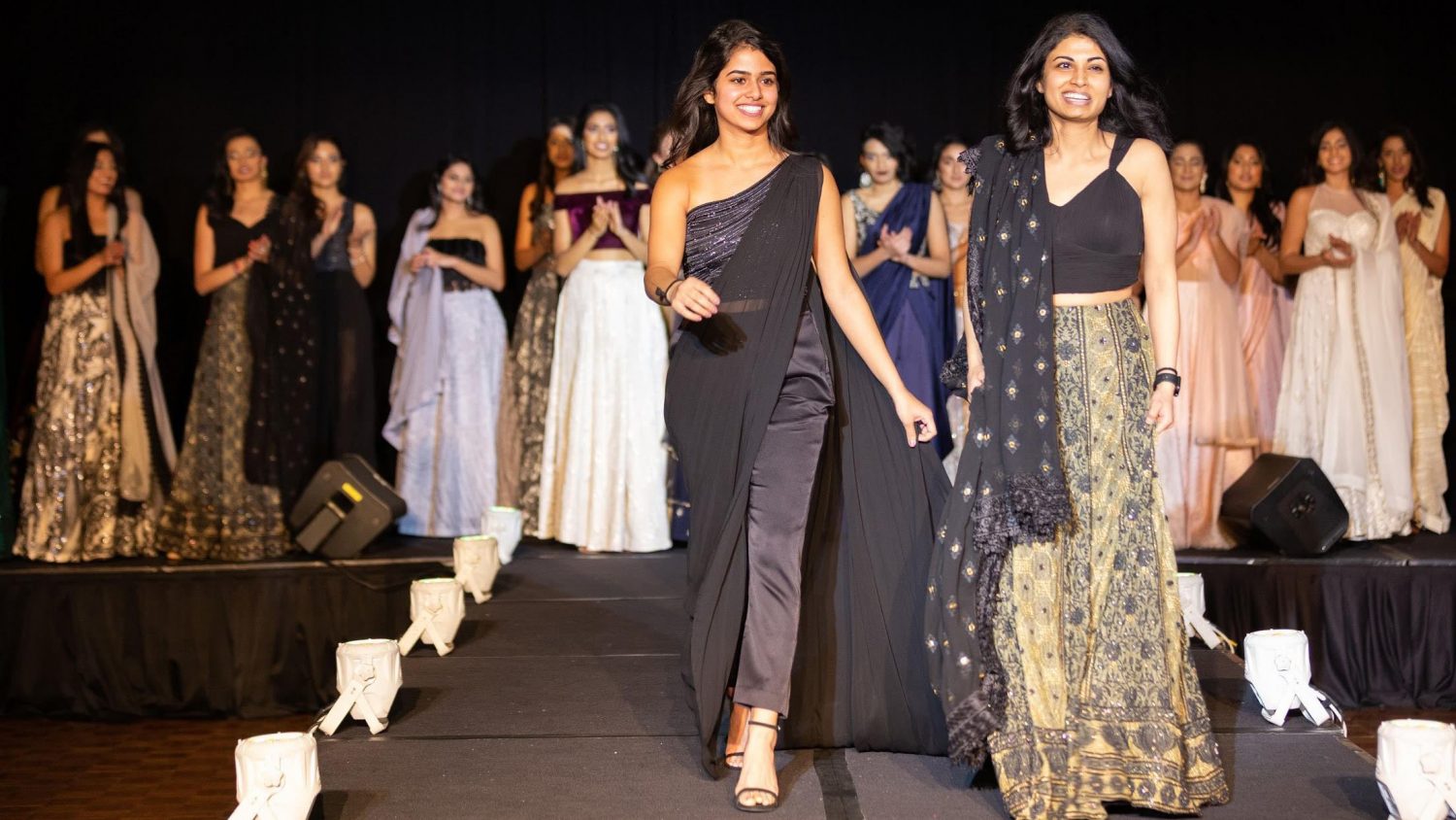 Niki and Ritika Shamdasani on a fashion runway