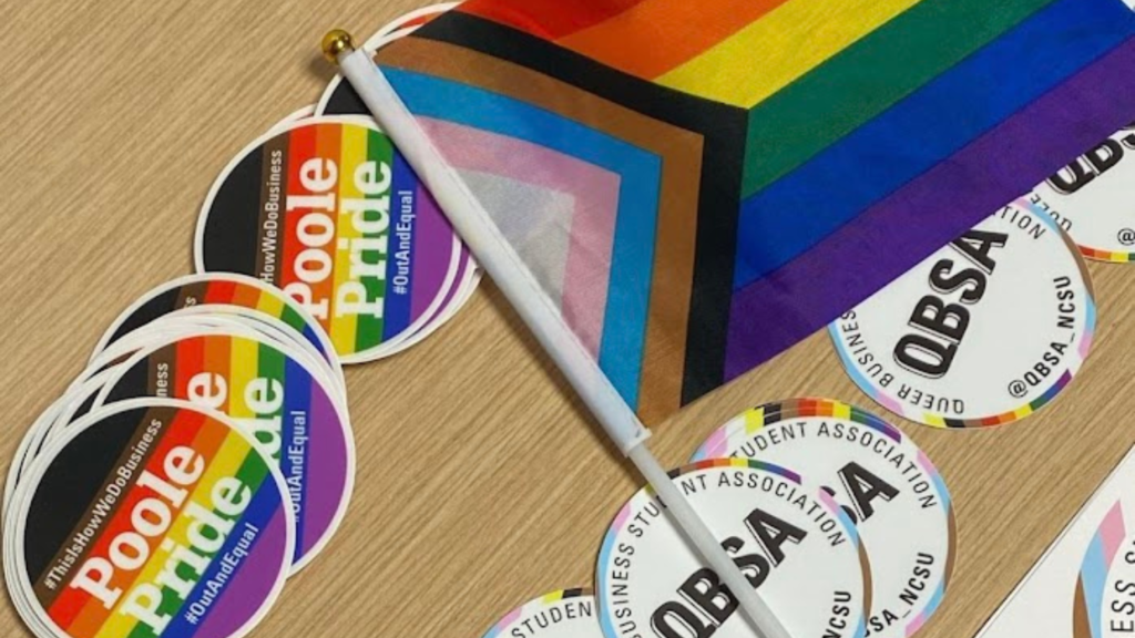 Poole pride supplies spread on table.