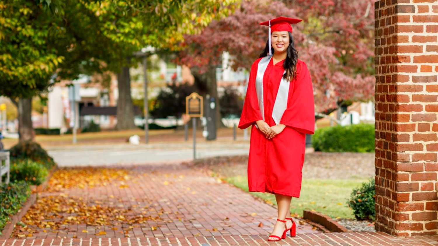 Poole student Elyza Tran in cap and gown