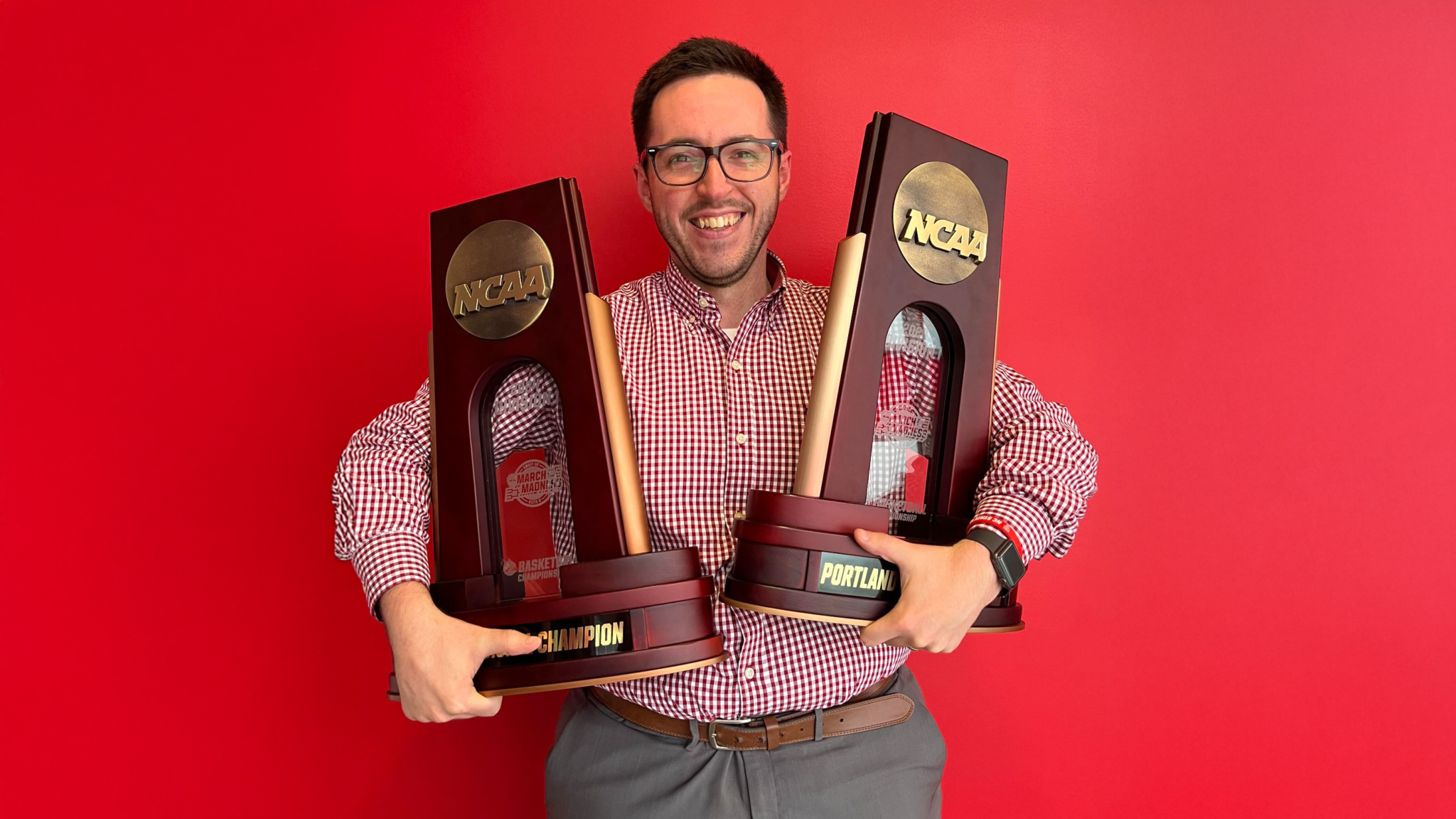 Patrick Gotimer holding trophies