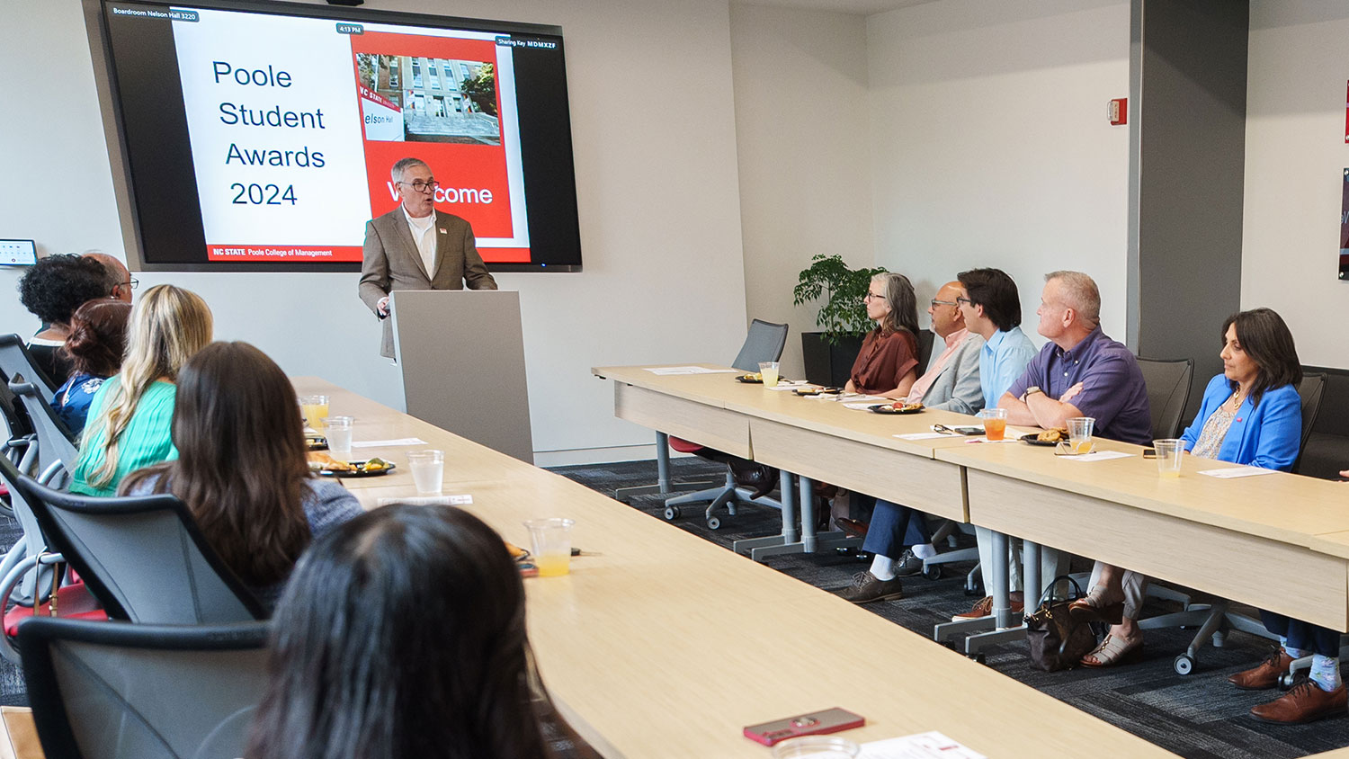 Poole College Dean Frank Buckless speaks at the inaugural Student Awards Luncheon in spring 2024.