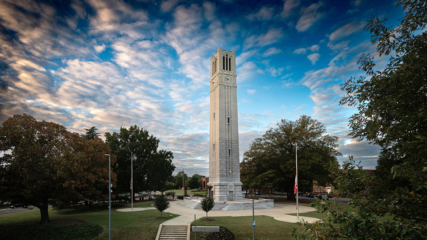 belltower against sky with with clouds