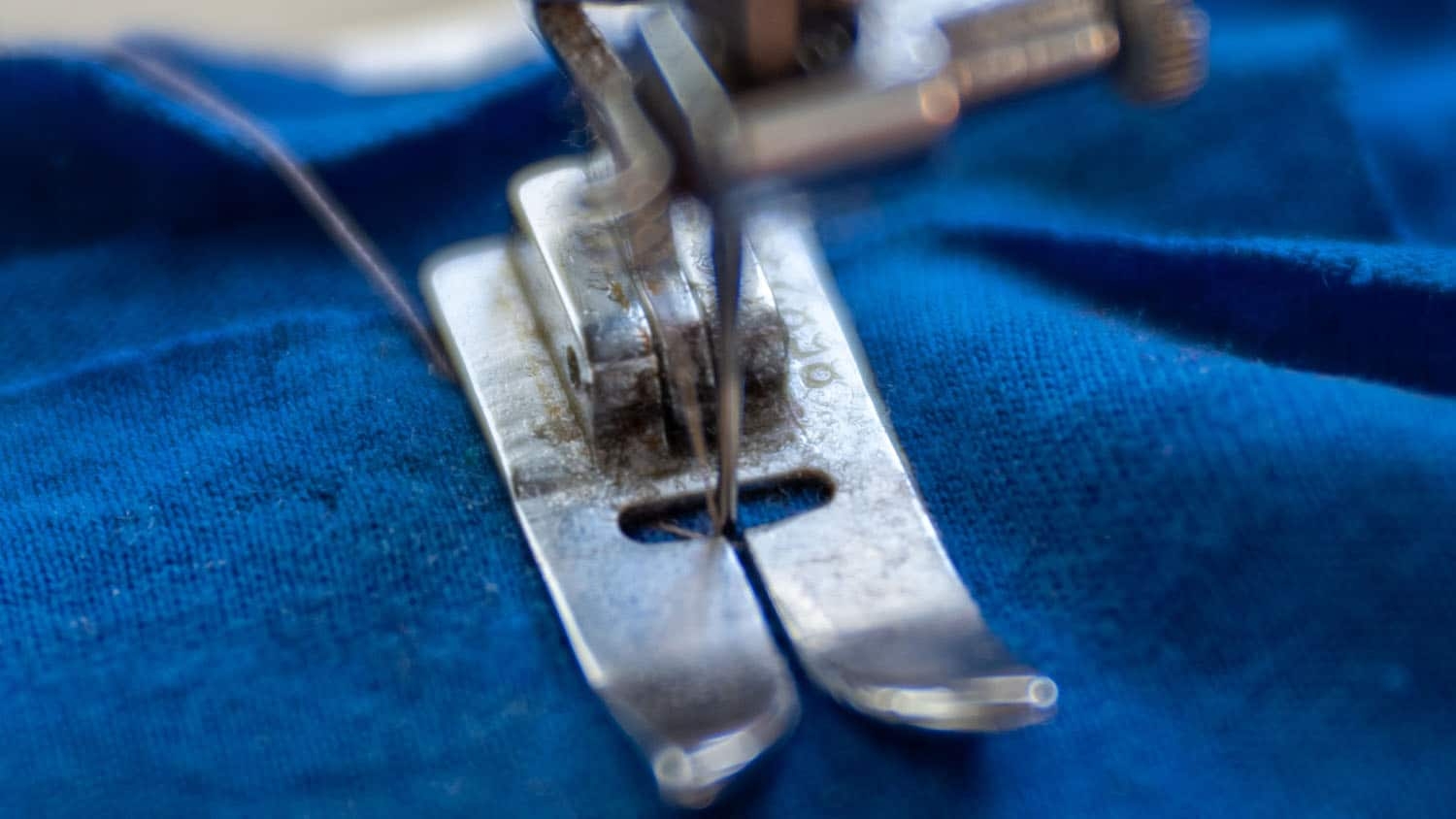 close-up photo of a sewing machine stitching a seam