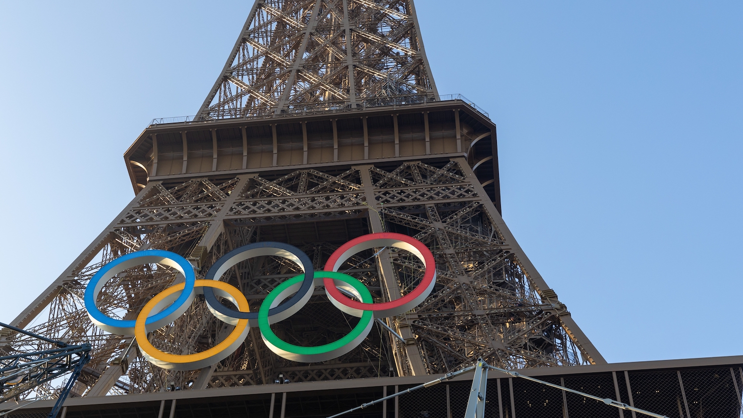 A photo of the Eiffel Tower in Paris with the Olympic rings added.