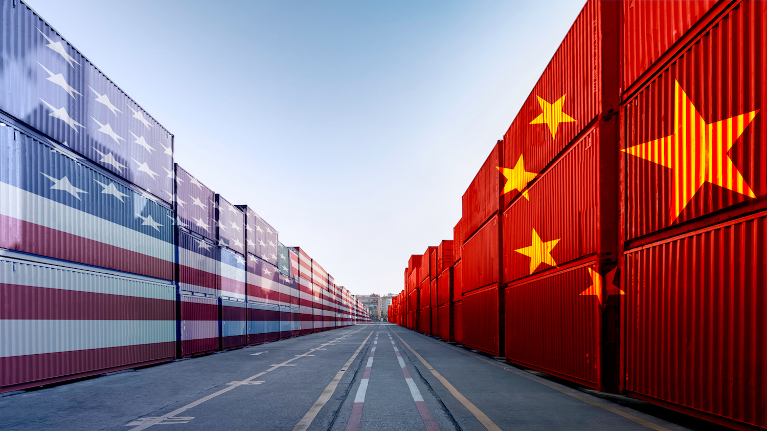 Two rows of shipping containers, one painted like the American flag and the other like the Chinese flag.