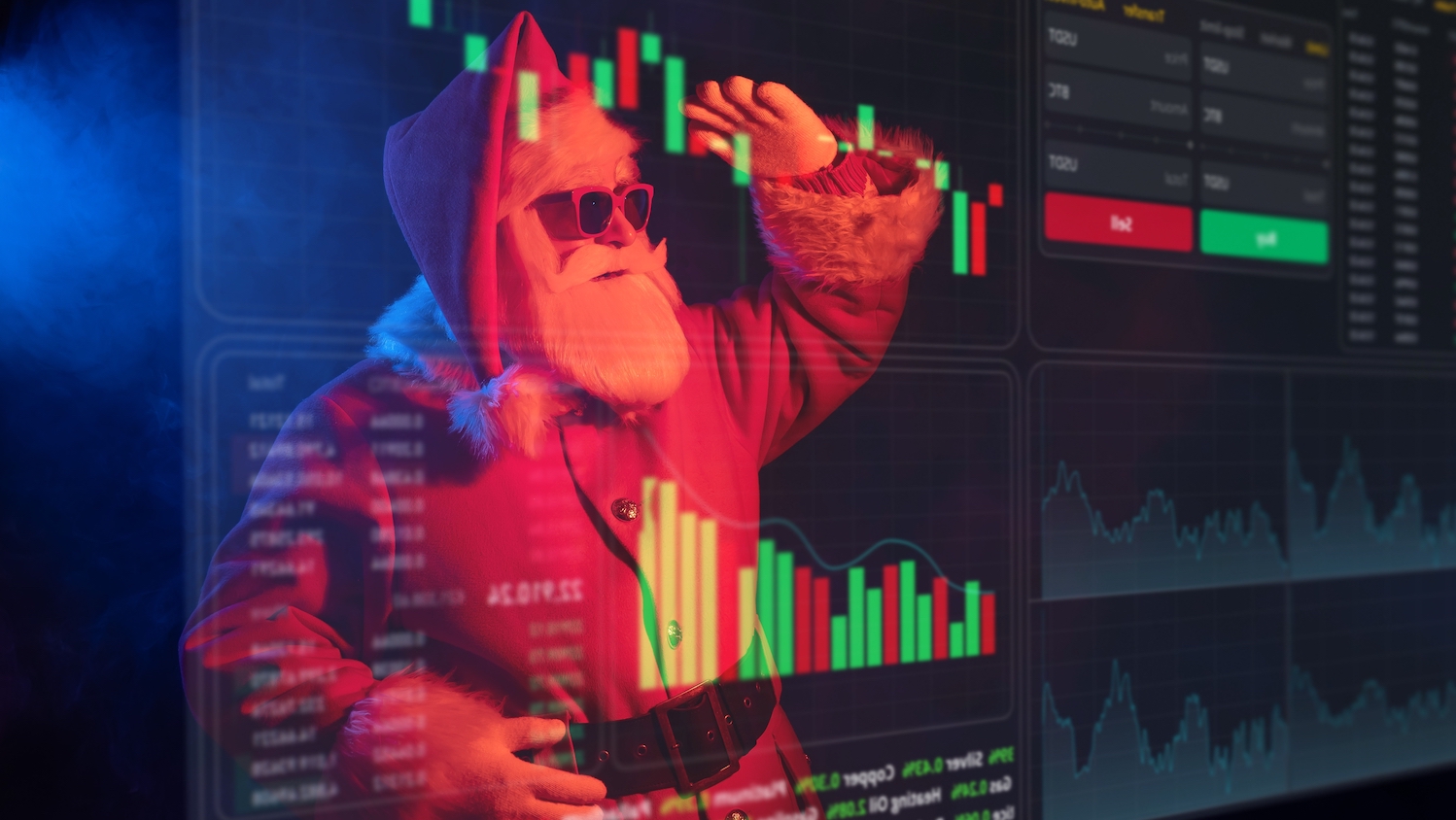 Santa Claus's image is reflected in a computer screen with green and red bar graphs suggesting financial performance.