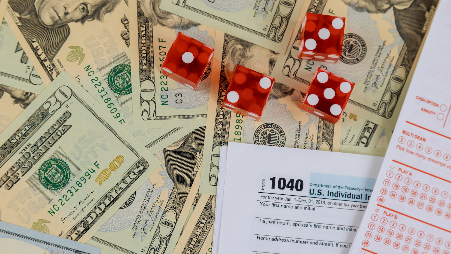USA tax accounting office paperwork on 1040 form financial time tax form with payment taxes of government lottery