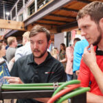 two students talk about a project