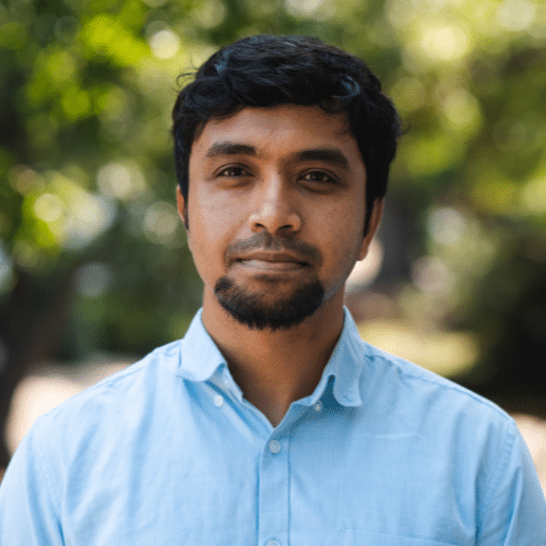 Rakesh Ravi in a blue shirt
