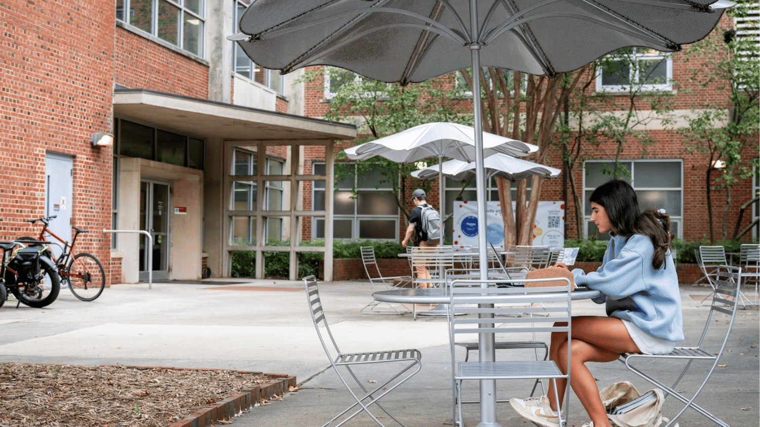 student eating outdoors