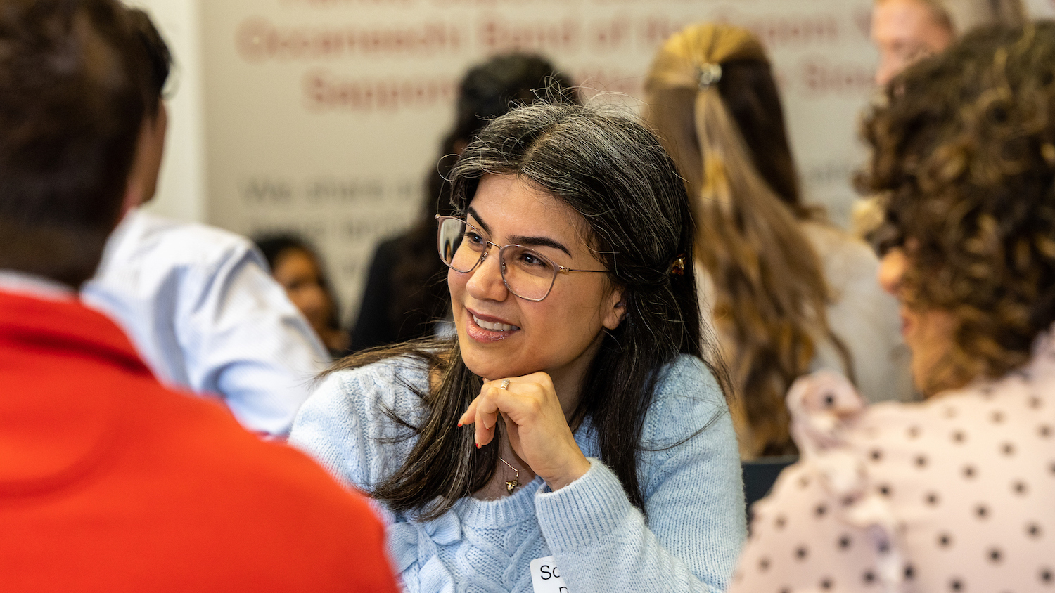 Female talking in Poole College