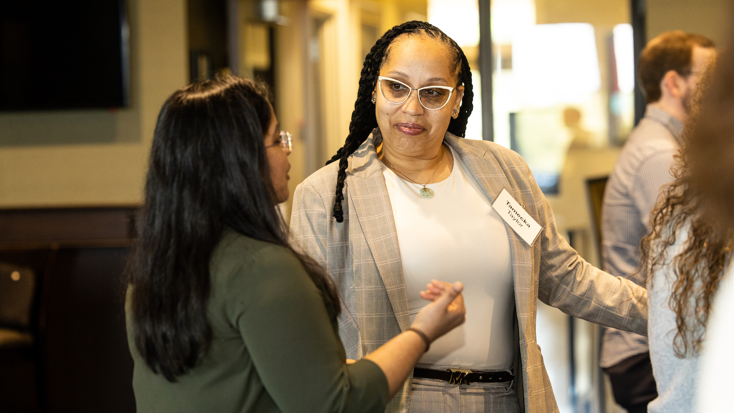 Two leadership students talking